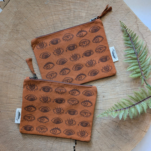 ilikesara | art + goods - Zippered pouch | eyeball - rust orange eye blockprint pencil, supply, makeup bag with waterproof lining