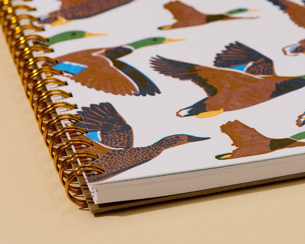 And Here We Are - Letterpress A5 Lined Spiral Notebook—Flying Ducks