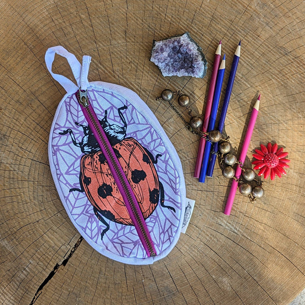 ilikesara | art + goods - Zippered pouch | ladybug - purple & red insect pencil, supply, makeup bag with waterproof lining