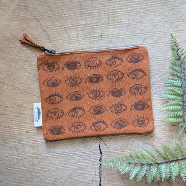 ilikesara | art + goods - Zippered pouch | eyeball - rust orange eye blockprint pencil, supply, makeup bag with waterproof lining