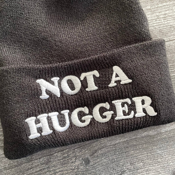 The Silver Spider - Not a Hugger knit hat beanie introvert winter Black blue