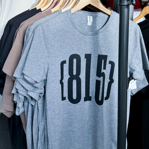 {815} Tee