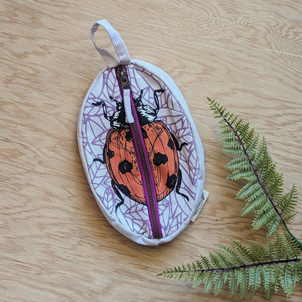 ilikesara | art + goods - Zippered pouch | ladybug - purple & red insect pencil, supply, makeup bag with waterproof lining